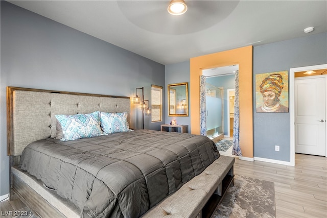 bedroom featuring ceiling fan and light wood-type flooring