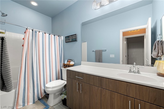 full bathroom with tile floors, large vanity, toilet, and shower / bathtub combination with curtain