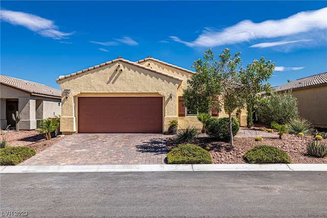 view of front of property with a garage