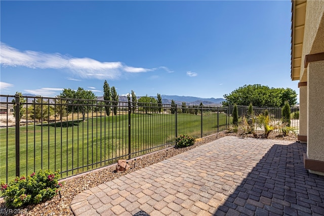 view of patio with a mountain view