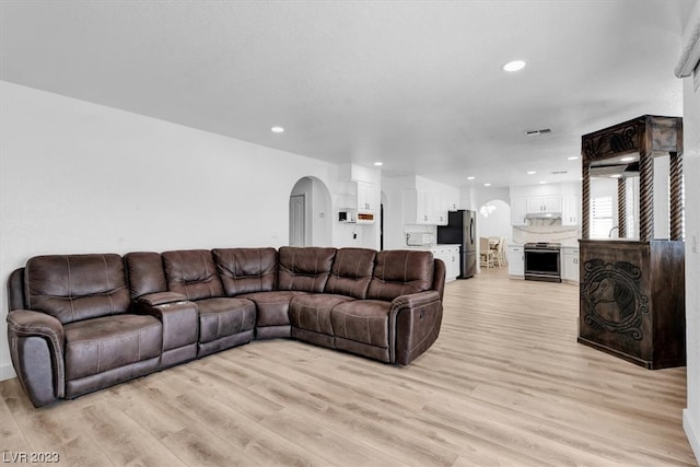 living room featuring light wood-type flooring