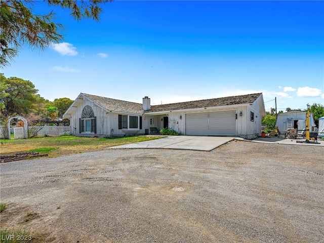 single story home with a garage