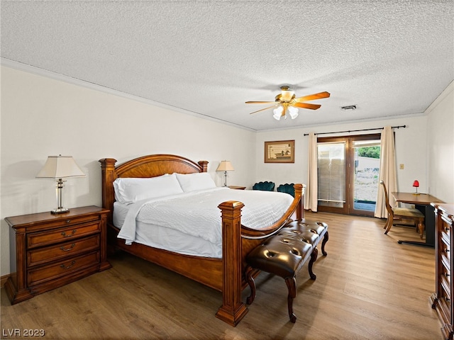 bedroom with a textured ceiling, ceiling fan, access to outside, and light wood-type flooring