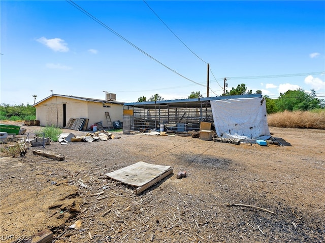 view of front of home with an outdoor structure