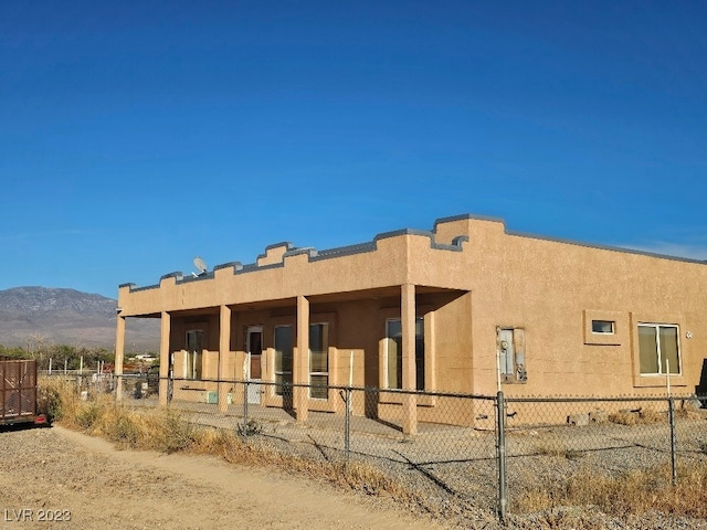 exterior space featuring a mountain view