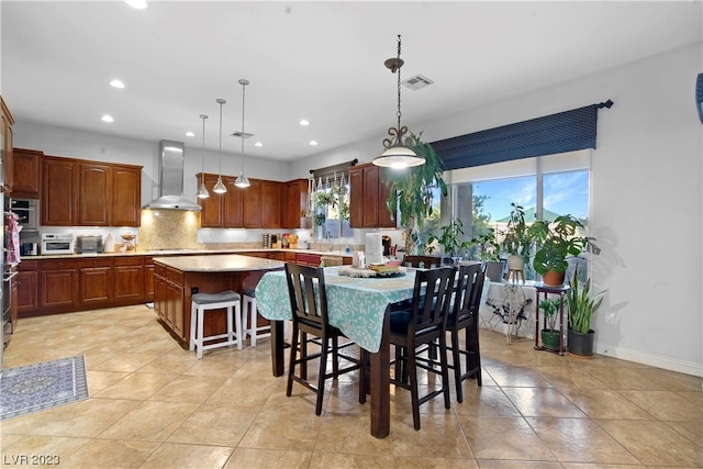 dining area with light tile floors