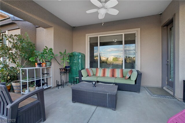 view of patio featuring ceiling fan and an outdoor living space