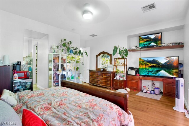 bedroom featuring light wood-type flooring