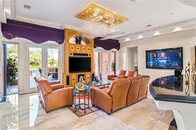 living room featuring crown molding, french doors, and a chandelier