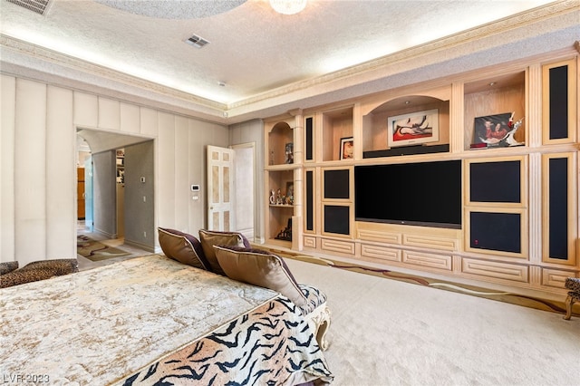 carpeted bedroom with a textured ceiling