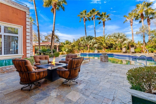 view of patio featuring a fire pit