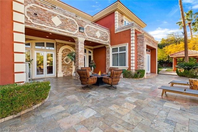 view of patio featuring french doors