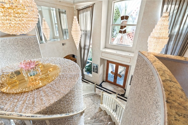 entrance foyer with a chandelier