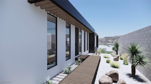 652 Dragon Peak, Henderson, NV 89012 - view of side of property featuring stucco siding