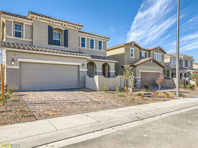 view of front of property featuring a garage