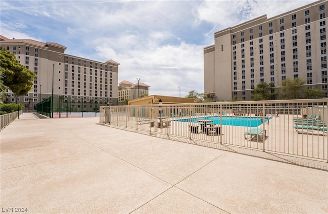 view of pool featuring a patio