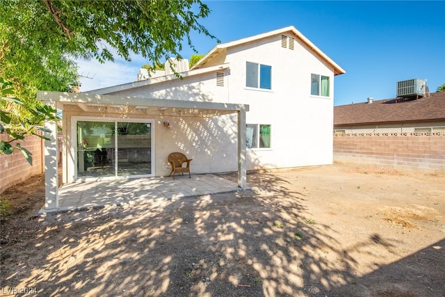 rear view of property with a patio area