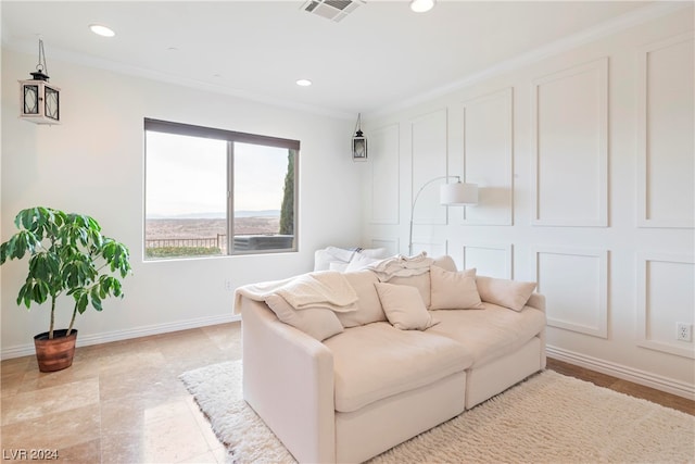 living room with crown molding