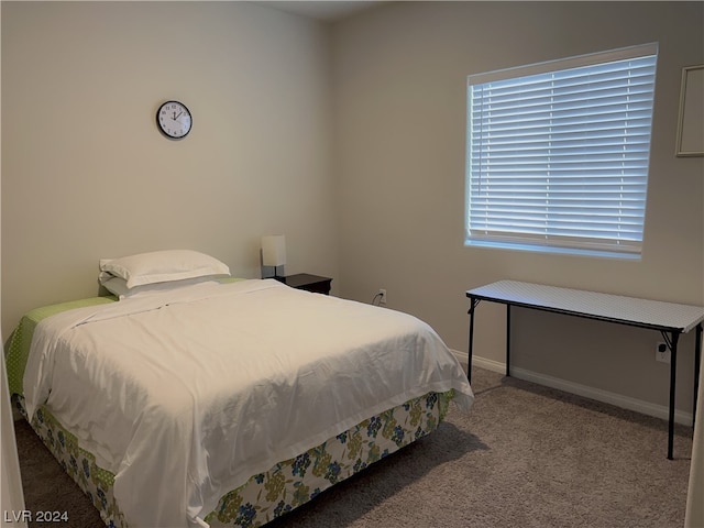 bedroom with light carpet