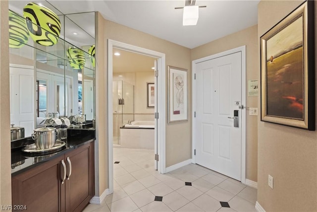 view of tiled foyer entrance