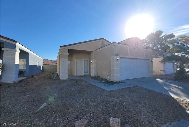 view of front of property with a garage