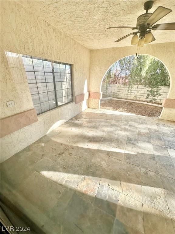 view of patio / terrace with ceiling fan