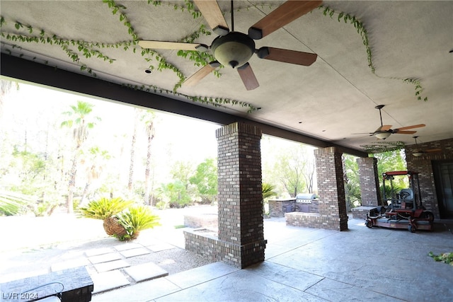 view of patio featuring ceiling fan