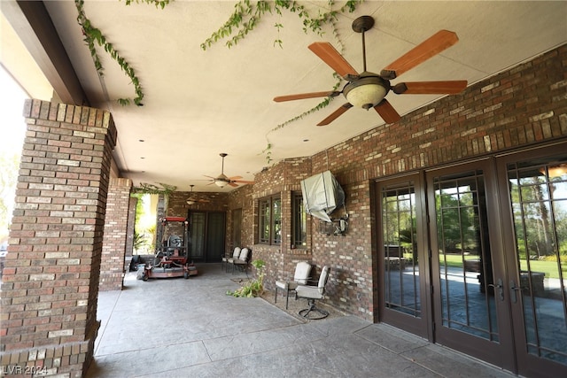 view of patio / terrace with ceiling fan and french doors