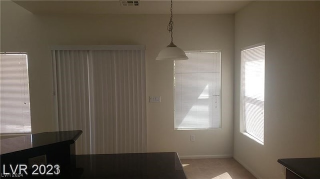 view of tiled dining space