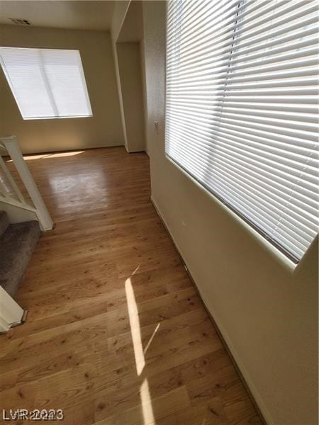 hallway featuring light hardwood / wood-style floors