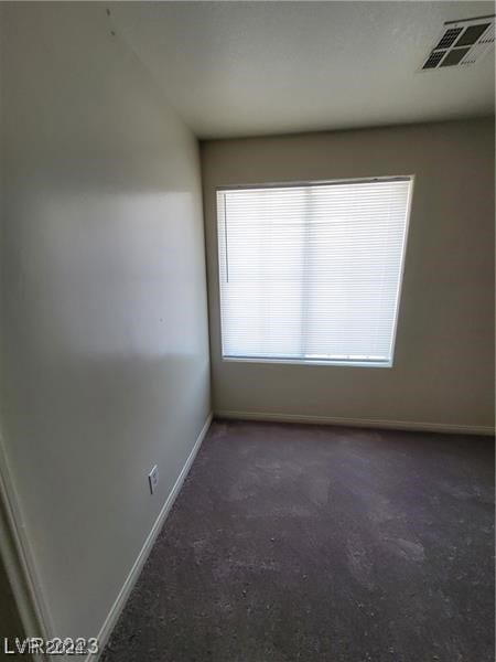 view of carpeted spare room