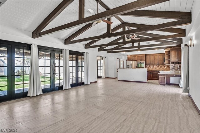 interior space with ceiling fan, high vaulted ceiling, light tile floors, beam ceiling, and french doors