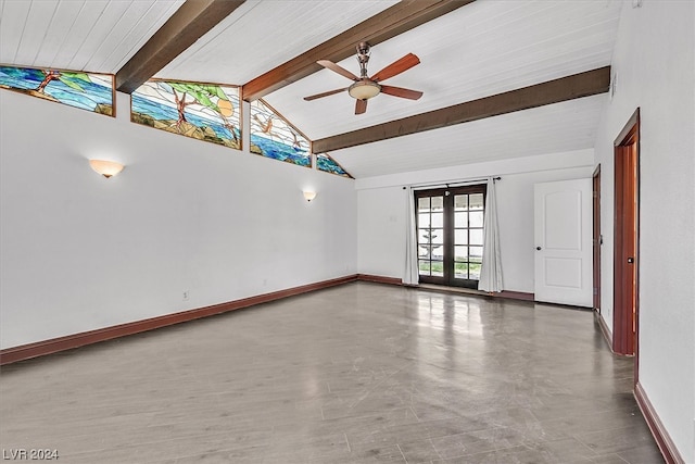 empty room with ceiling fan, vaulted ceiling with beams, and french doors