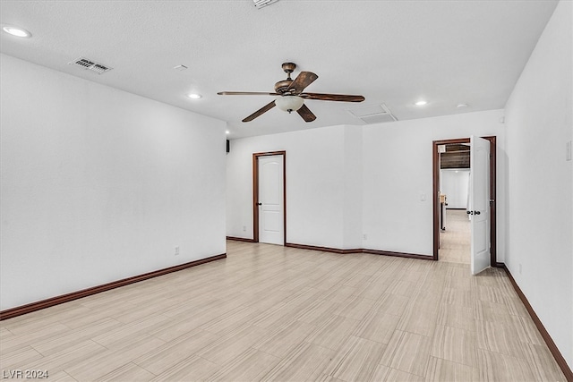 empty room with ceiling fan