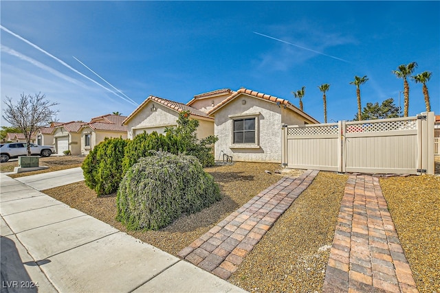 5717 Wizard Wand St, North Las Vegas, NV 89031 - mediterranean / spanish house featuring stucco siding and a tiled roof