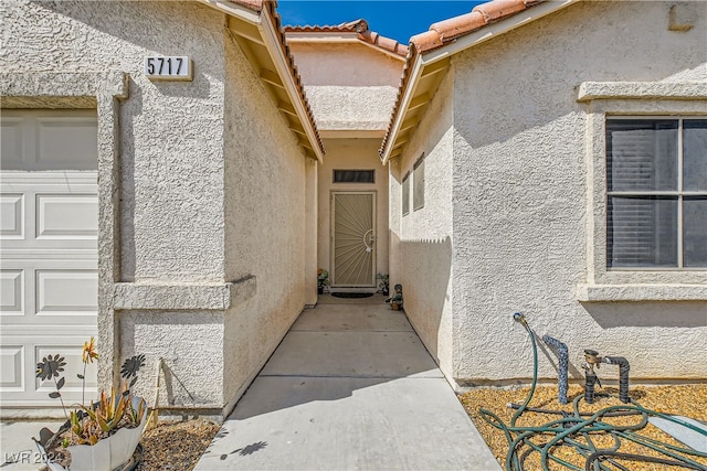 5717 Wizard Wand St, North Las Vegas, NV 89031 - property entrance with stucco siding