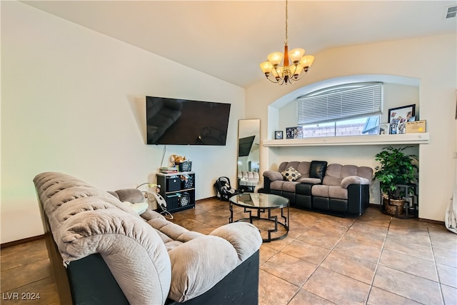5717 Wizard Wand St, North Las Vegas, NV 89031 - tiled living area with a chandelier and vaulted ceiling