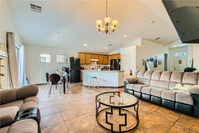 5717 Wizard Wand St, North Las Vegas, NV 89031 - living room featuring vaulted ceiling, light tile patterned flooring, a chandelier, and recessed lighting