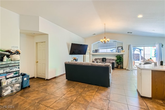 5717 Wizard Wand St, North Las Vegas, NV 89031 - living room featuring vaulted ceiling, a chandelier, light tile patterned flooring, and recessed lighting