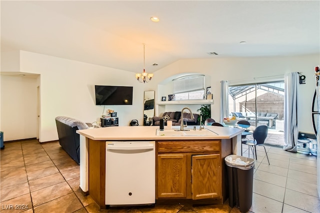 5717 Wizard Wand St, North Las Vegas, NV 89031 - kitchen with dishwasher, open floor plan, vaulted ceiling, a sink, and a center island with sink