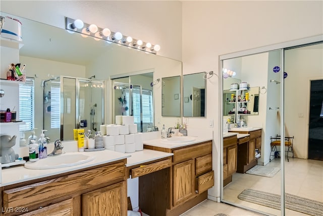 5717 Wizard Wand St, North Las Vegas, NV 89031 - full bath with a shower stall, vanity, and tile patterned floors