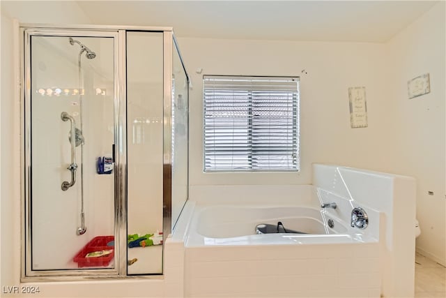 5717 Wizard Wand St, North Las Vegas, NV 89031 - full bathroom featuring a garden tub, a shower stall, and toilet