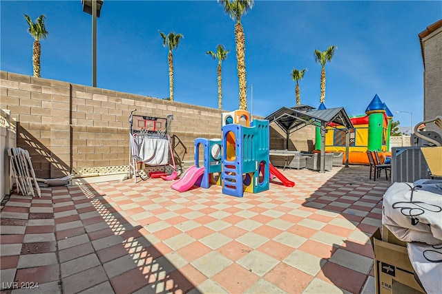 5717 Wizard Wand St, North Las Vegas, NV 89031 - community jungle gym featuring a patio area