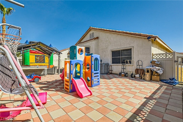 5717 Wizard Wand St, North Las Vegas, NV 89031 - view of play area featuring a patio