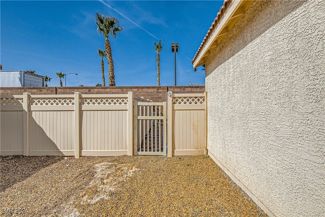 5717 Wizard Wand St, North Las Vegas, NV 89031 - view of yard featuring a gate
