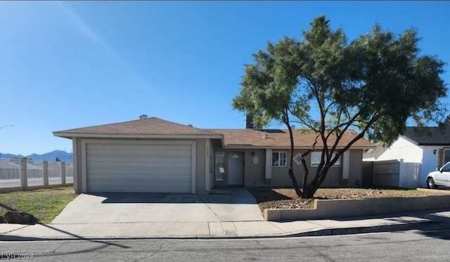 single story home with a garage