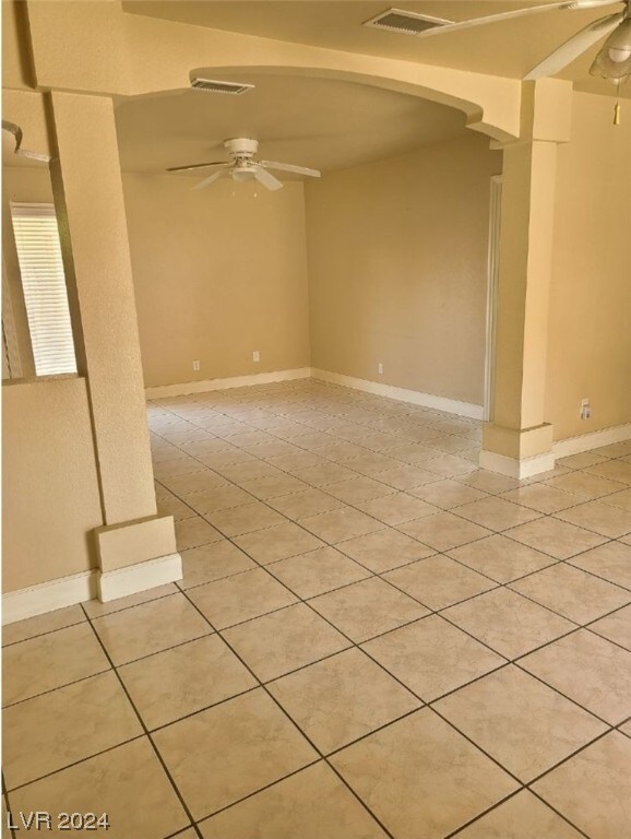4999 Nellis Cir, Las Vegas, NV 89120 - empty room with ceiling fan and light tile floors
