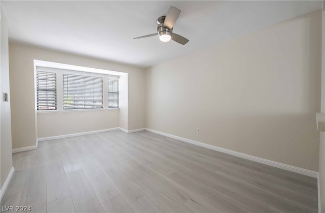 unfurnished room with light hardwood / wood-style floors and ceiling fan