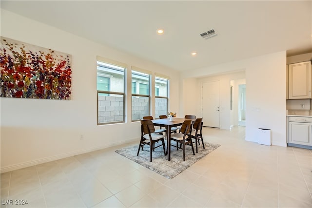 dining space with light tile patterned flooring