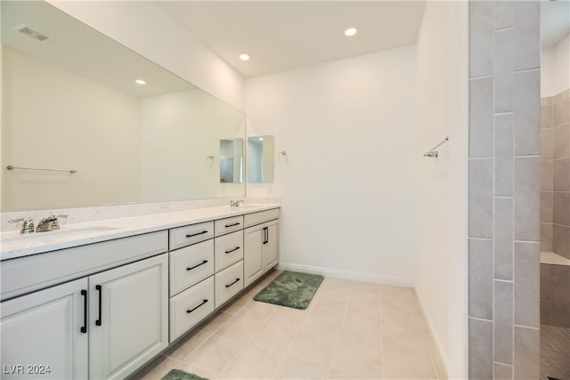 bathroom featuring tile patterned floors and vanity